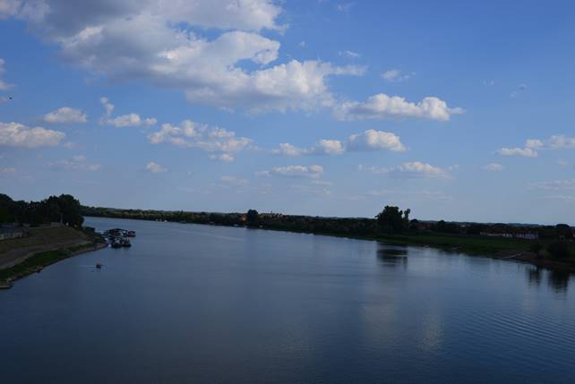 A bridge over a body of water

Description generated with very high confidence