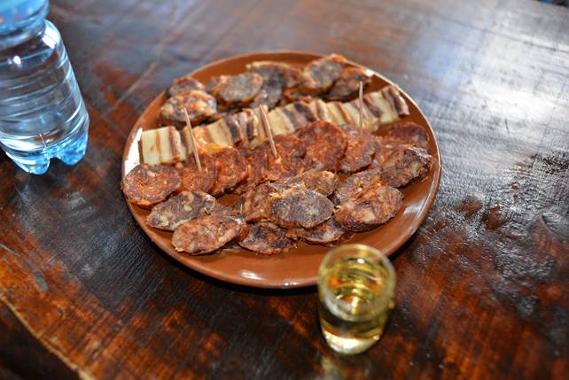 A close up of food on a wooden table

Description generated with high confidence