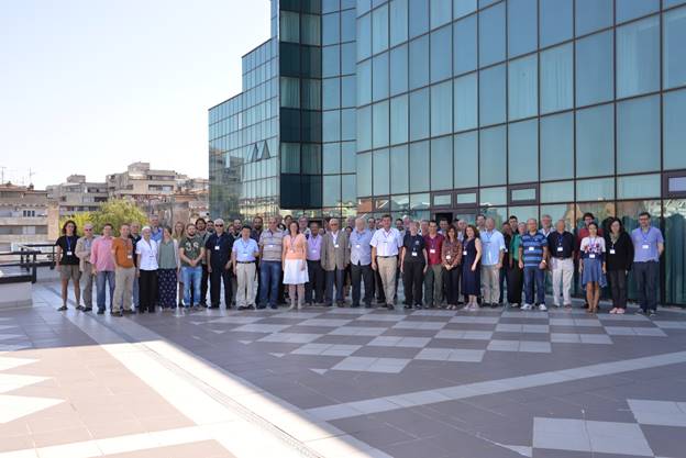 A group of people on a city street

Description generated with very high confidence