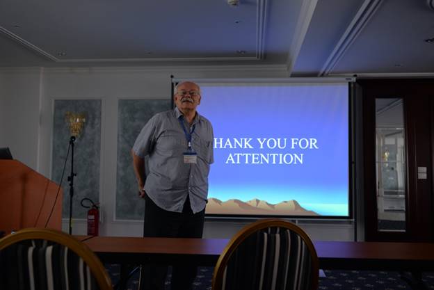 A person standing in front of a television

Description generated with high confidence